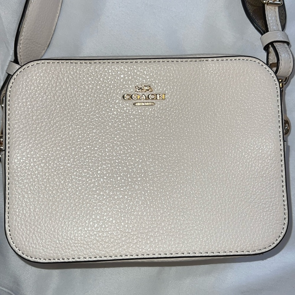 COACH camera bag. Removable strap. Strap is 23 inches long. Can use as crossbody